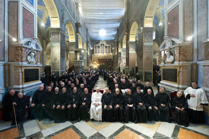 Leo sits next to Francis during their meeting in August 2013.