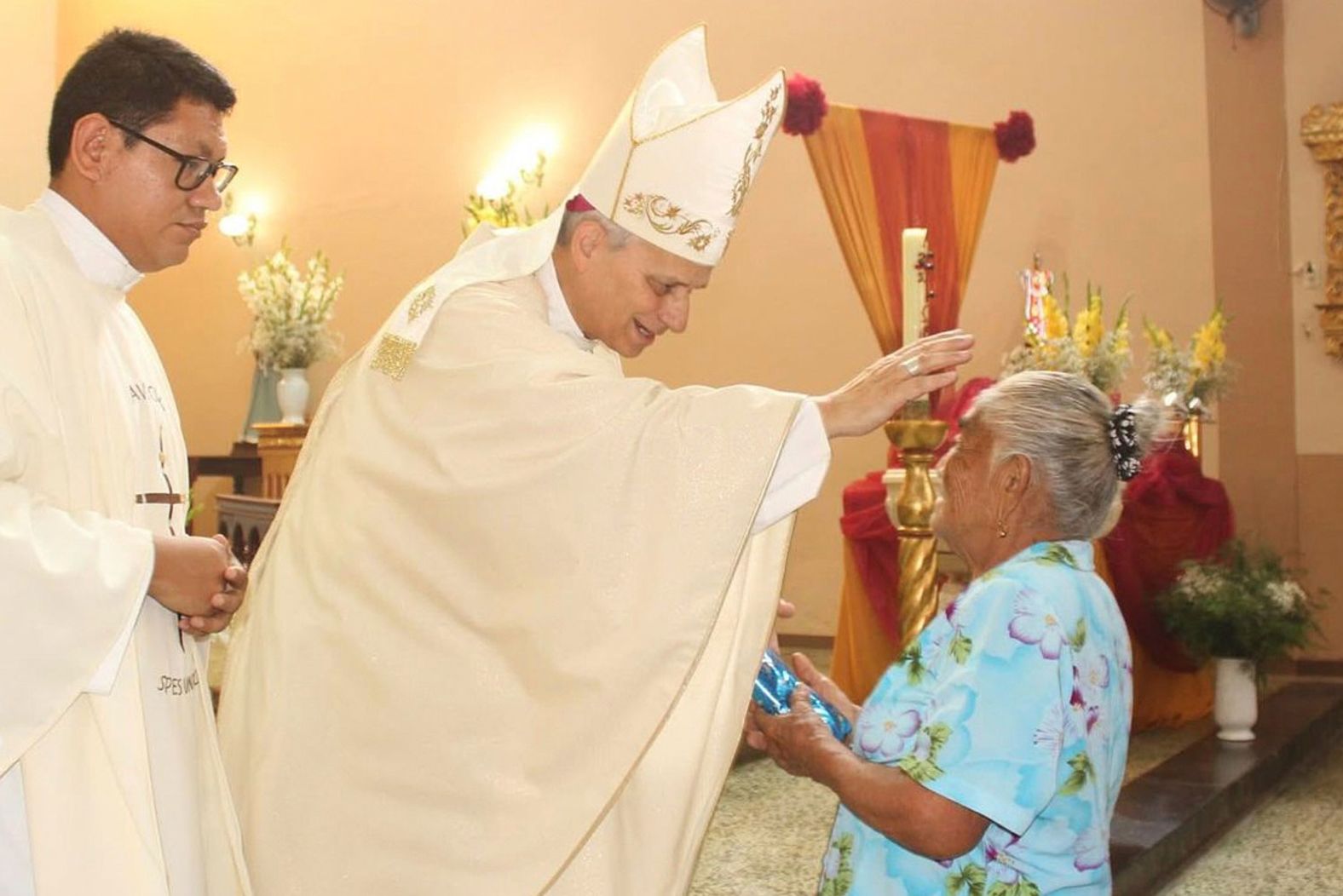 Leo blesses a woman during a Mass in Motupe, Peru, in 2020.