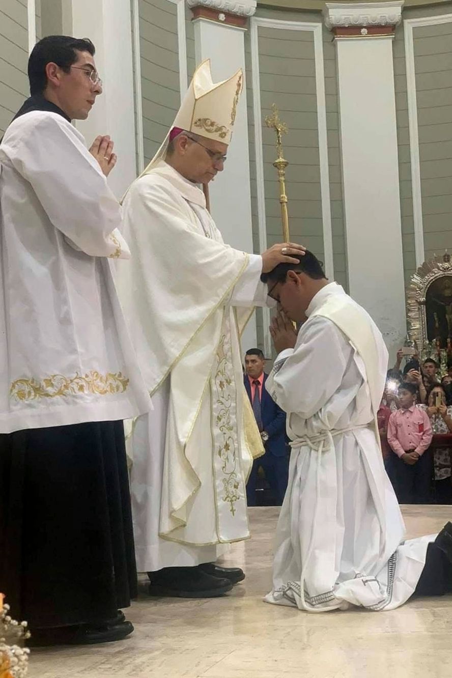 Leo blesses a member of the clergy during a Mass in Chiclayo in 2021.