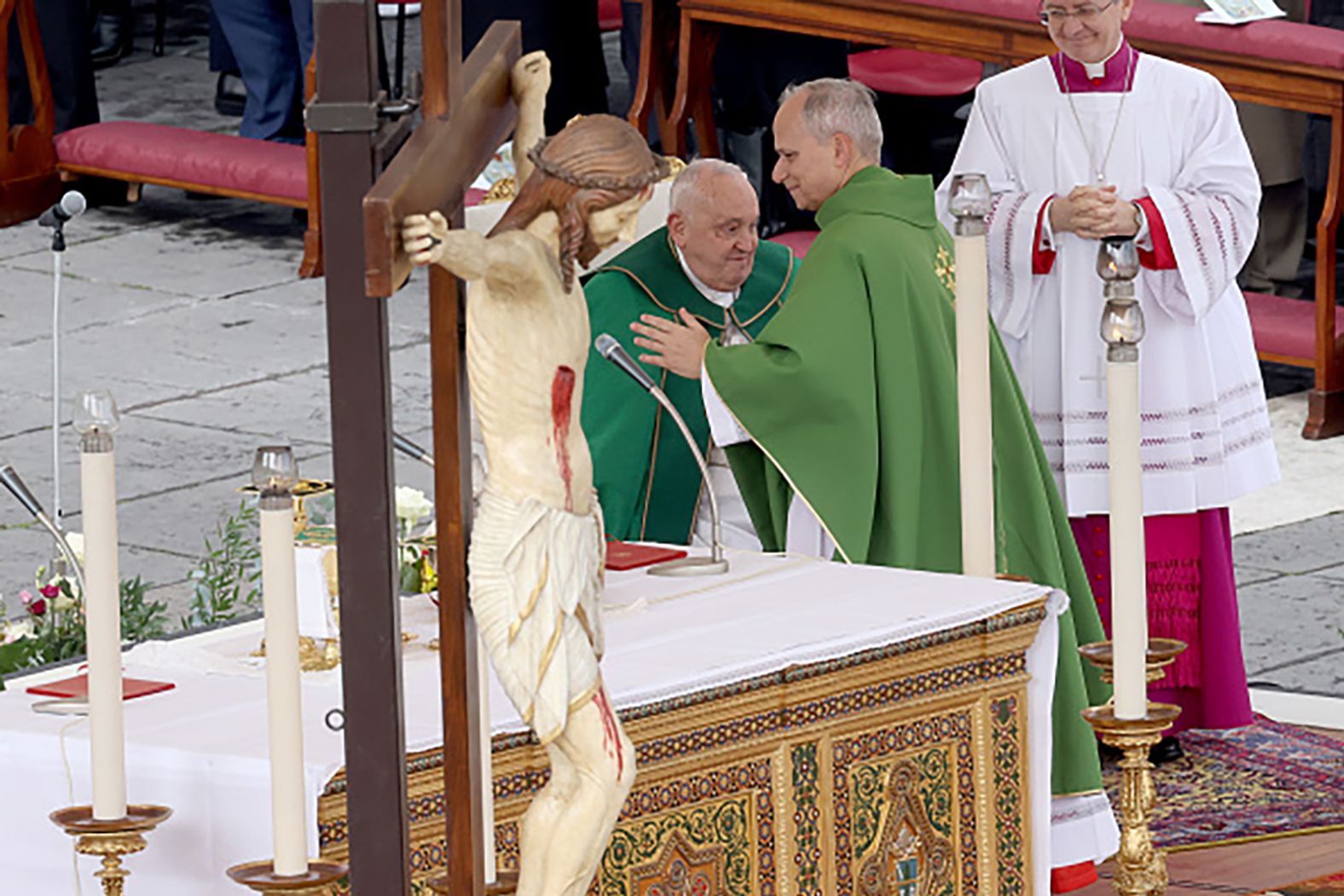 Pope Francis greets Leo during a Mass at St. Peter's Square in February 2025.