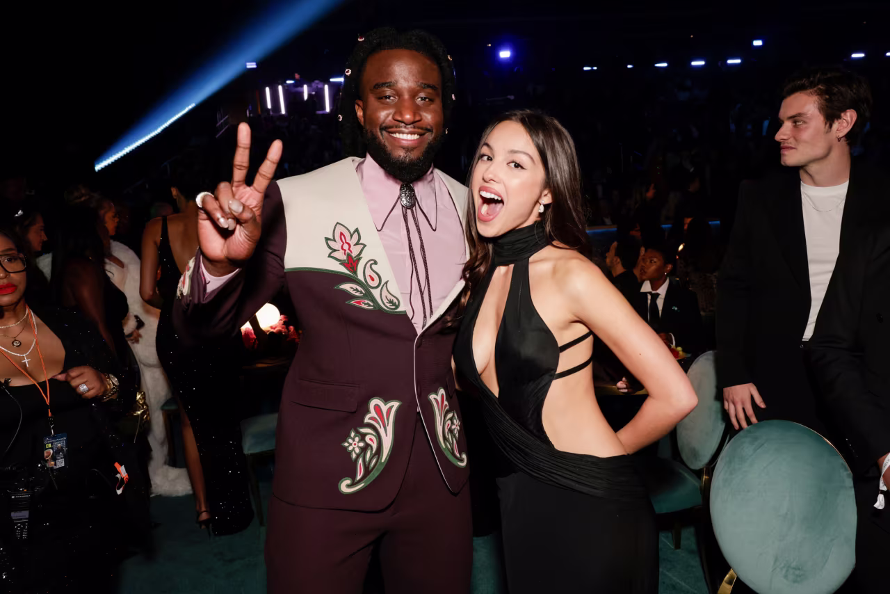 Shaboozey and Olivia Rodrigo take a photo together.