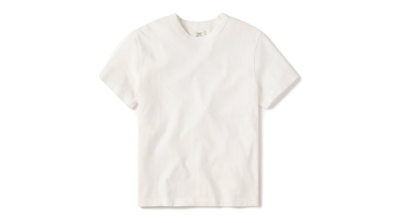 A Buck Mason white T-shirt on a white background.