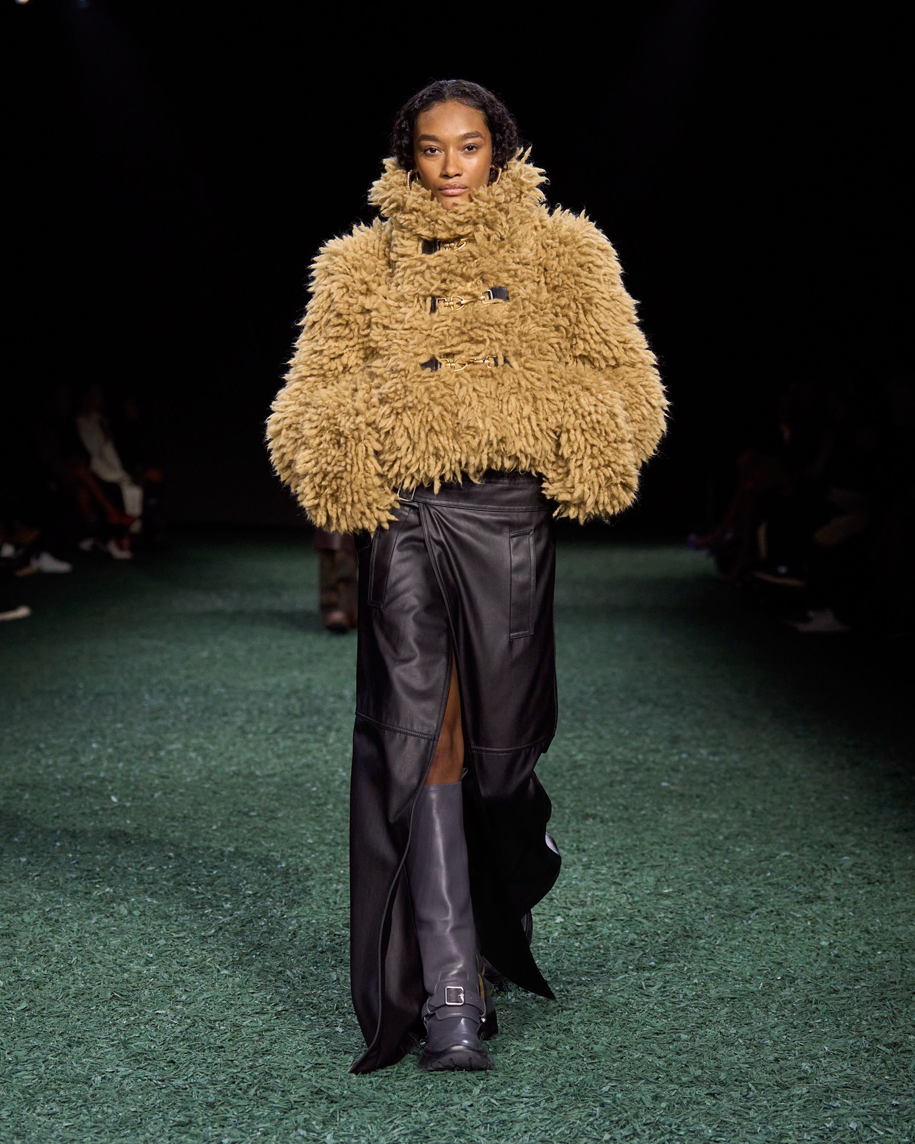 High-collared shearling jackets were finished with horsebit buckles and hardware.