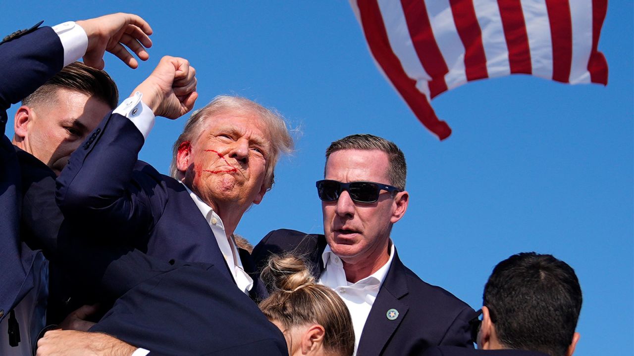 Republican presidential candidate former President Donald Trump is surround by U.S. Secret Service agents at a campaign rally, Saturday, July 13, 2024, in Butler, Pa. (AP Photo/Evan Vucci)