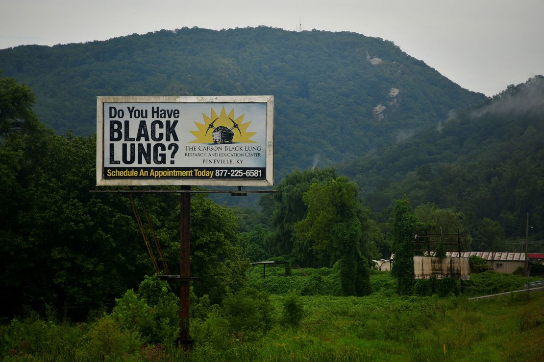 A billboard targeted at coal miners suffering from black lung is seen from the highway outside of Pineville, Kentucky, in August 2019.