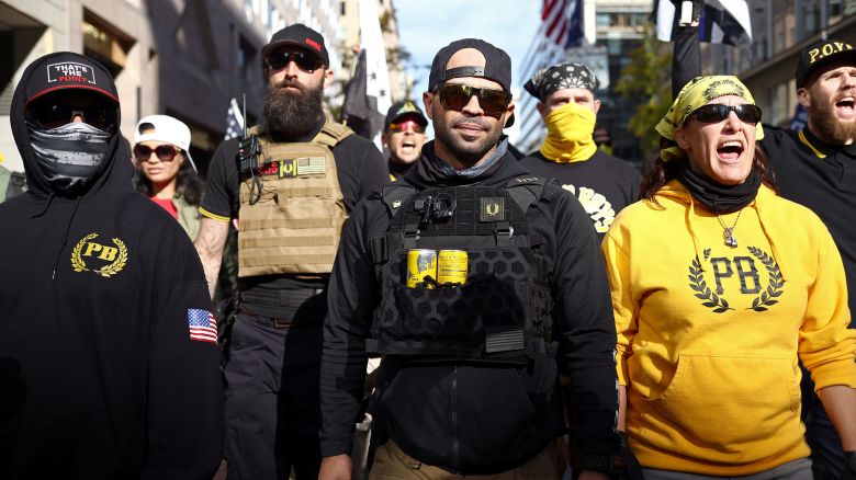 Members of the far-right Proud Boys, including leader Enrique Tarrio, center, rally in support of President Donald Trump to protest against the results of the 2020 presidential election, in Washington, DC, in November 2020.