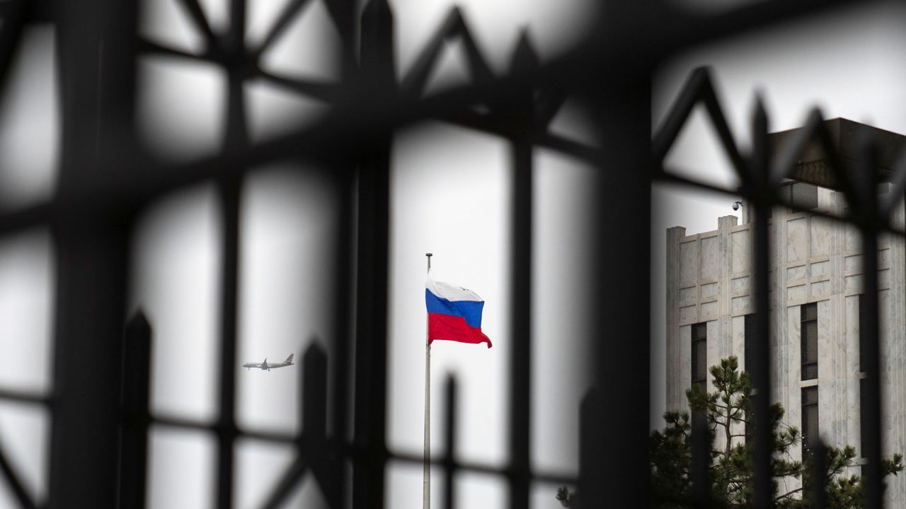 The Russian flag flies above the Embassy of the Russian Federation in Washington, DC, in February 2022.