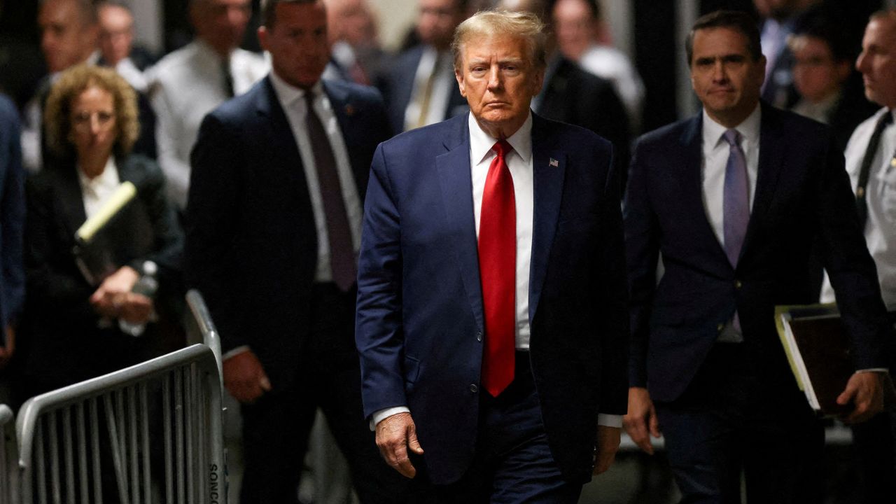 Former President Donald Trump walks outside the courtroom on the day of a court hearing on charges of falsifying business records to cover up a hush money payment to a porn star before the 2016 election, in New York State Supreme Court in the Manhattan borough of New York City, on February 15. 