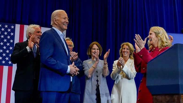 Kerry Kennedy and other members of the Kennedy family applaud as US President Joe Biden smiles at a campaign event at the Martin Luther King Recreation Center in Philadelphia, Pennsylvania, on April 18.