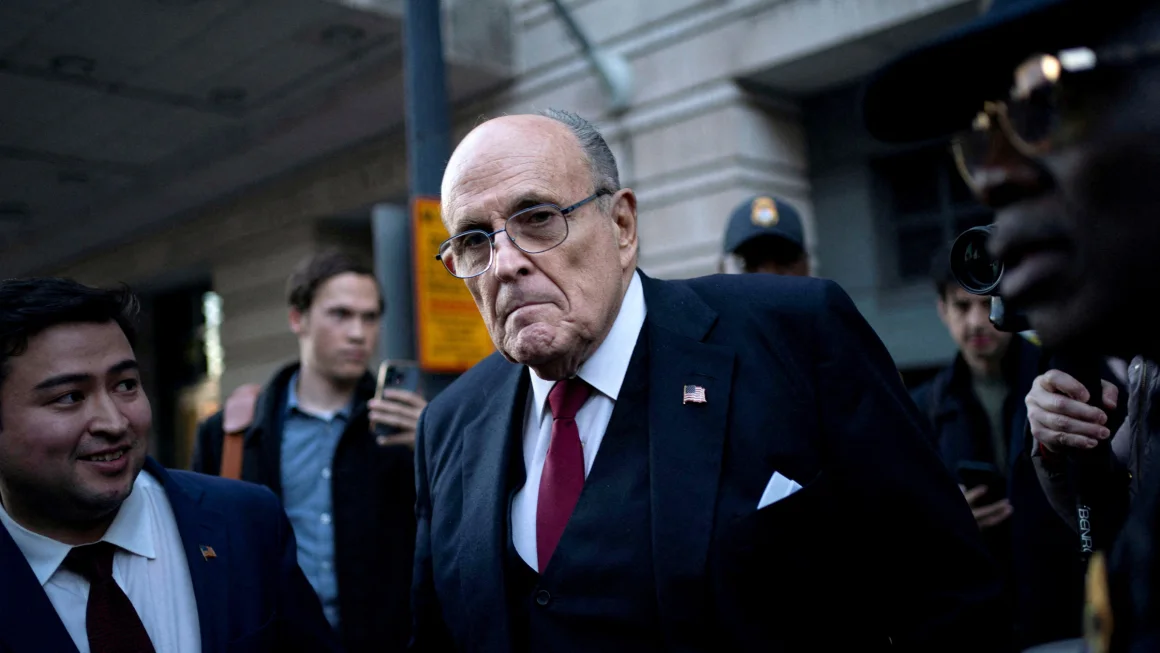 c-2024-05-14t203600z-1433678151-rc2xx4afslot-rtrmadp-3-usa-trump-giuliani-bankruptcy.jpg