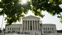 People line up to get into the US Supreme Court on the day where decisions ares expected to be handed down, in Washington, DC, on June 26. 