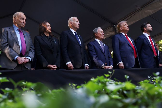 From left, Senate Majority Leader Chuck Schumer, Harris, President Joe Biden, former New York City Mayor Michael Bloomberg, Trump and Vance attend a ceremony in New York <a href=