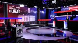 Minnesota Gov. Tim Walz and Sen. JD Vance attend a debate hosted by CBS News in New York on Tuesday.