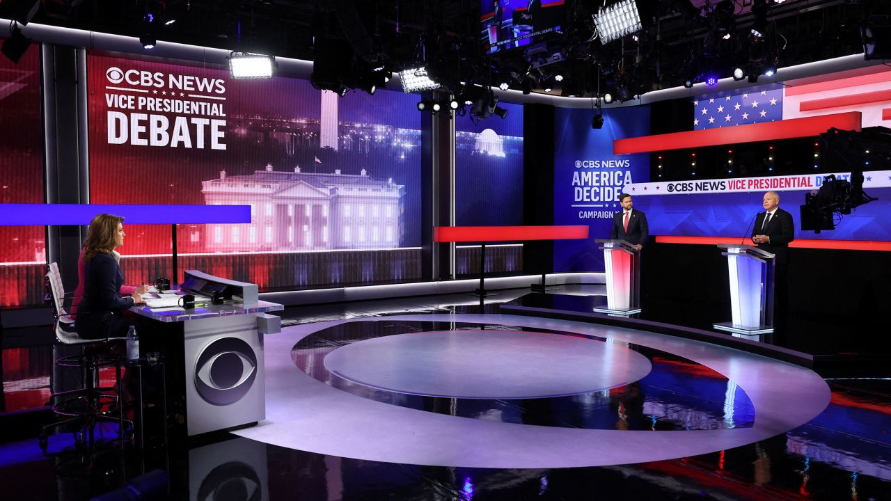 Minnesota Gov. Tim Walz and Sen. JD Vance attend a debate hosted by CBS News in New York on Tuesday.