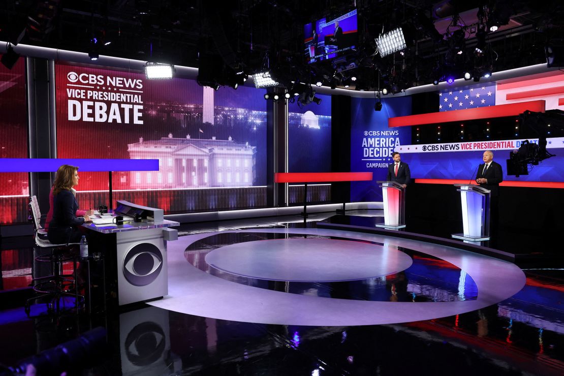 Minnesota Gov. Tim Walz and Sen. JD Vance attend a debate hosted by CBS News in New York on Tuesday.