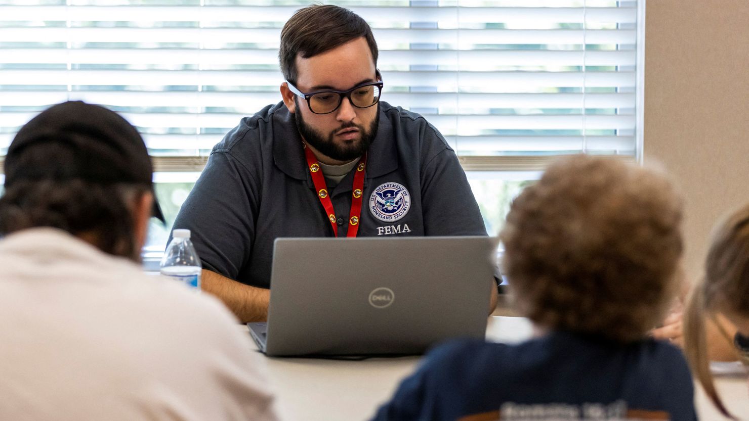 A FEMA worker attends claims by local residents after being affected by floods following the passing of Hurricane Helene, in Marion, North Carolina, on October 5.