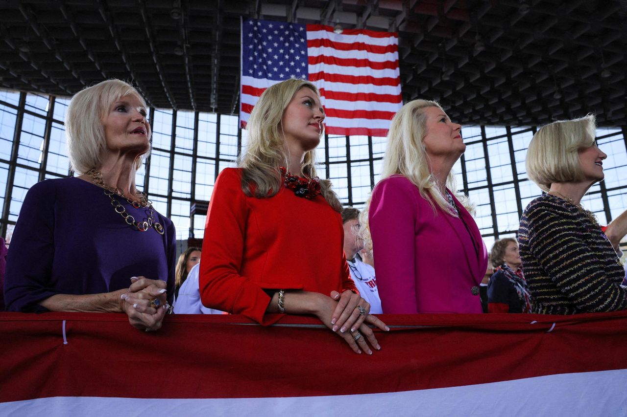 Supporters, known as the "North Carolina Girls", look on as Trump holds a campaign rally at J.S. Dorton Arena in Raleigh, North Carolina, on November 4. 