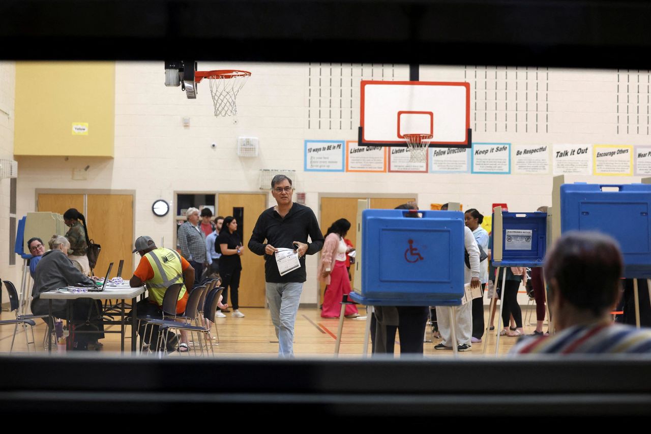 People vote at a polling station on Election Day at the Brier Creek Community Center in Raleigh, North Carolina on Tuesday.