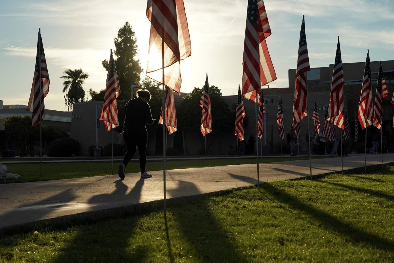 A voter walks outside Mesa Community College in Mesa, Arizona, on Tuesday.