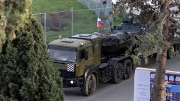 a russian military vehicle heads towards hmeimim air base in coastal latakia, syria on december 15. 