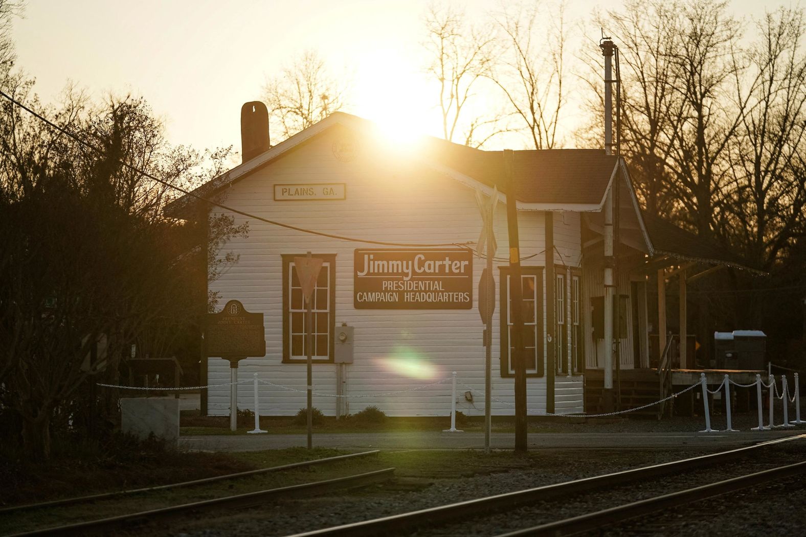 The sun sets over the railway depot that served as former President Jimmy Carter's 1976 presidential campaign headquarters, in Plains, Georgia, on January 3.