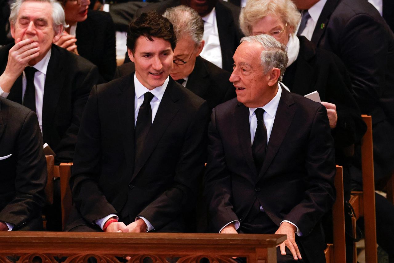 Canada's Prime Minister Justin Trudeau talks on the day of the State Funeral for former President Jimmy Carter at the Washington National Cathedral in Washington, DC, on January 9. 