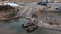 A drone view shows National Guard troops taking a break on the shore of the Rio Grande River outside of Shelby Park in Eagle Pass, Texas, on January 17. 