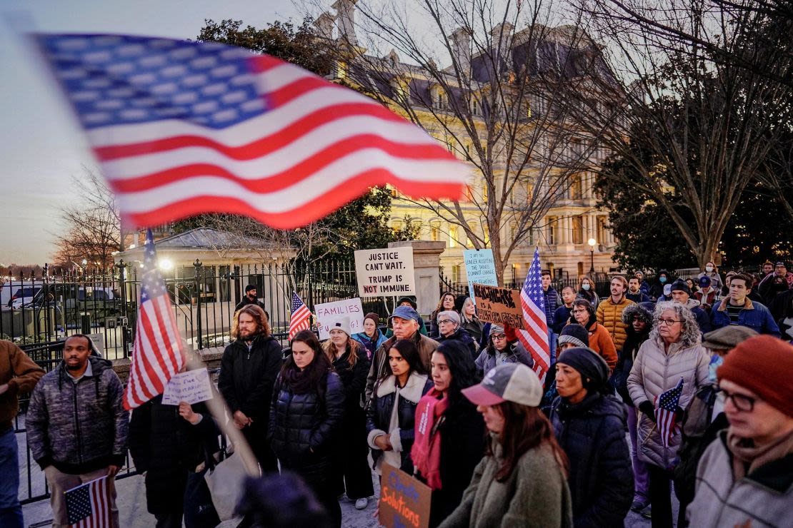 People gathered during a demonstration in support of federal financing and in opposition to the order of President Donald Trump to stop all federal subsidies and loans, near the White House in Washington, on January 28.