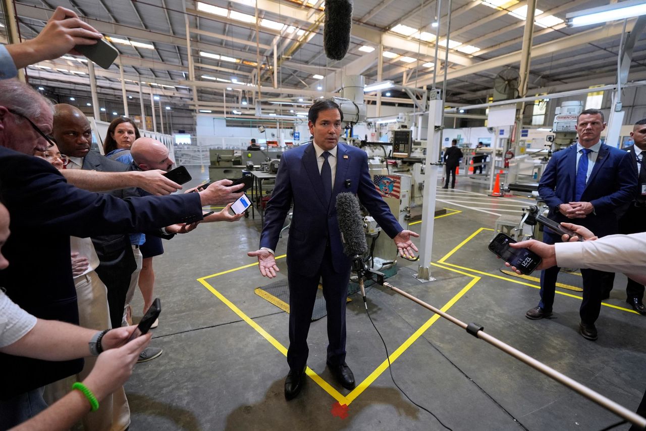 Secretary of State Marco Rubio speaks to the media during a visit to workshops of aircraft maintenance firm Aeroman in San Luis Talpa, El Salvador, on February 3. 