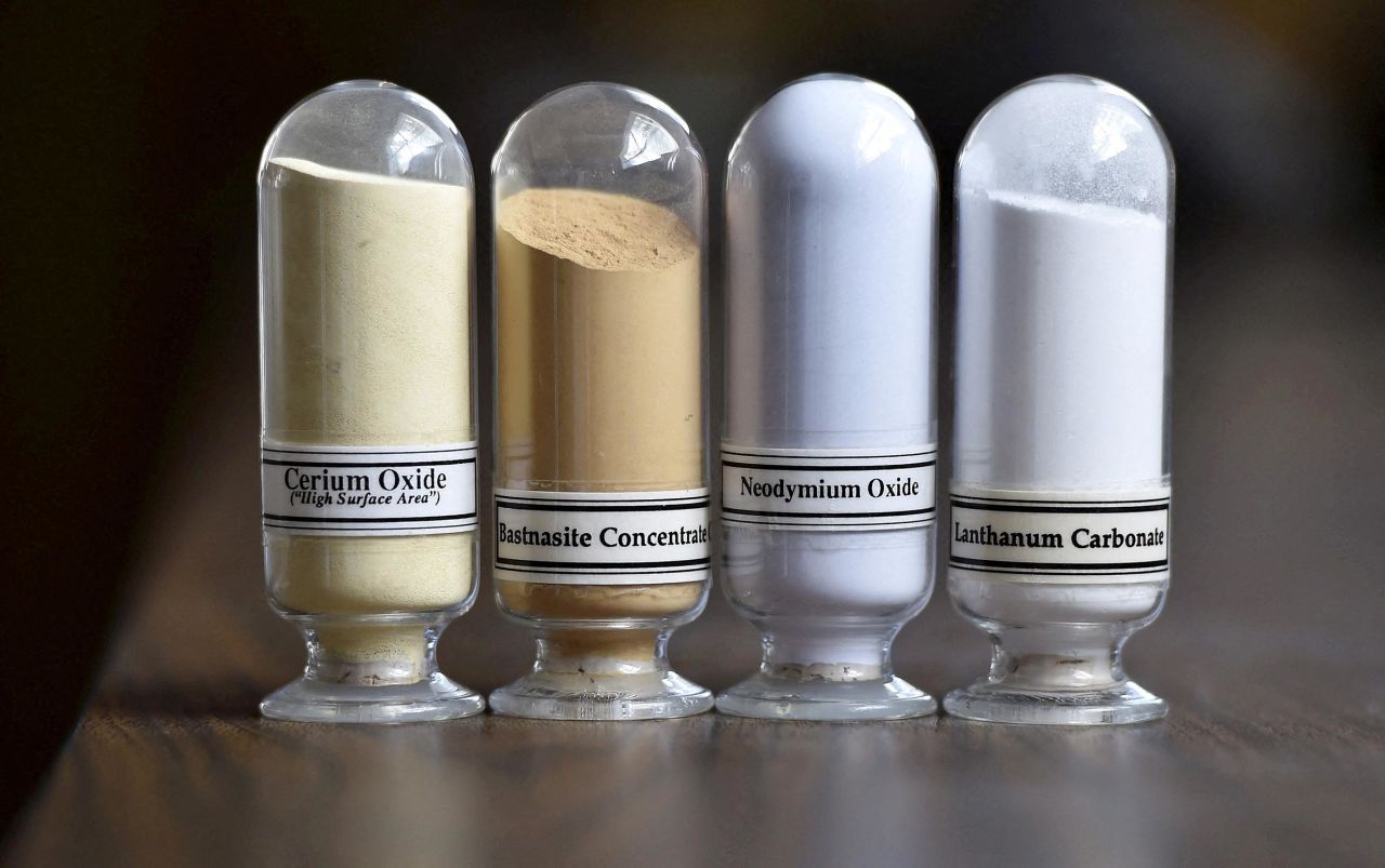 This 2015 photo shows samples of rare earth minerals from left, Cerium oxide, Bastnasite, Neodymium oxide and Lanthanum carbonate during a tour of Molycorp's Mountain Pass Rare Earth facility in Mountain Pass, California.