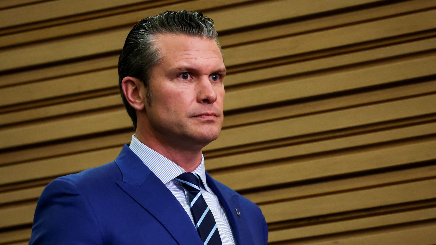 US Defense Secretary Pete Hegseth arrives for a press conference during a NATO Defense Ministers meeting at the Alliance's headquarters in Brussels, Belgium, on February 13.