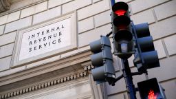 A traffic light is red outside the US Internal Revenue Service building in Washington, DC, on February 20. 