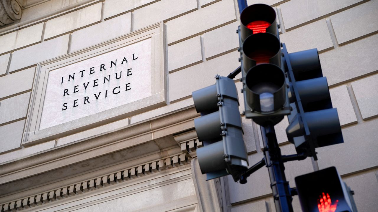 A traffic light is red outside the US Internal Revenue Service building in Washington, DC, on February 20. 