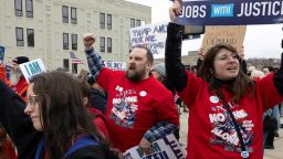 Federal workers shout chants during a rally across the street from the Internal Revenue Service headquarters in Kansas City, Missouri, on March 15. 