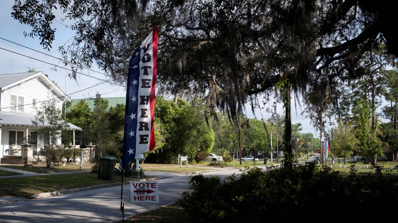 A voting sign is seen outside a polling station at the GFWC Woman's Club of Palatka, in Palatka, Florida, on April 1. 