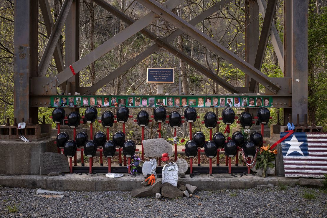 A memorial honoring the 29 miners who died in the 2010 Upper Big Branch Mine explosion stands beneath an abandoned conveyor beltline in Packsville, West Virginia, on April 12.