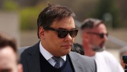 George Santos, who was expelled from the U.S. House of Representatives, departs after the sentencing in his criminal corruption charges at Central Islip Federal Courthouse in Central Islip, New York, on April 25, 2025.