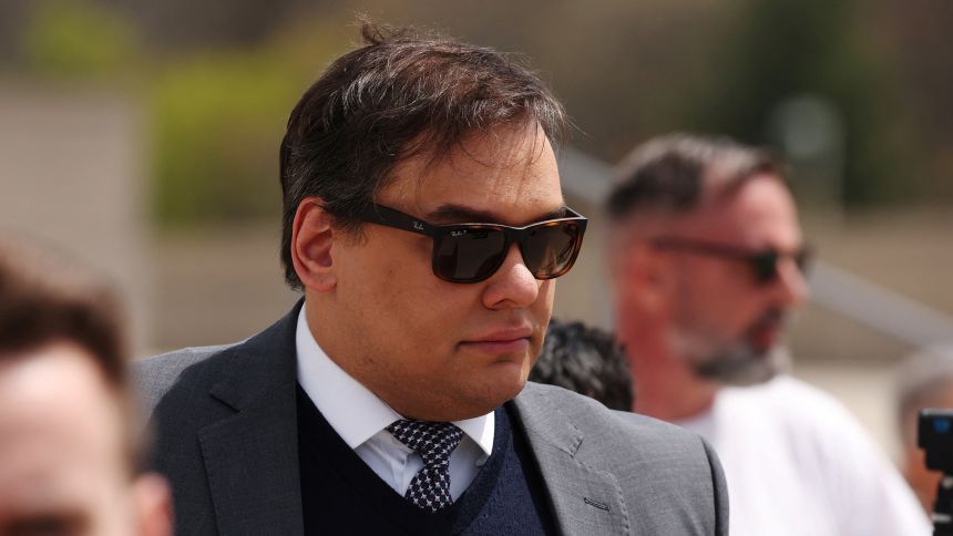 George Santos, who was expelled from the U.S. House of Representatives, departs after the sentencing in his criminal corruption charges at Central Islip Federal Courthouse in Central Islip, New York, on April 25, 2025.