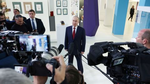 In this photo provided by Russian state-owned news agency Sputnik, Russian President Vladimir Putin meets with journalists following a phone call with US President Donald Trump at the Sirius educational centre for gifted children near Sochi in the Krasnodar region of Russia on May 19.