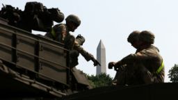 The Washington Monument is seen in the background as soldiers work on an M1A2/Abrams tank ahead of the upcoming US Army 250th anniversary celebration parade in Washington, DC, on June 11. 