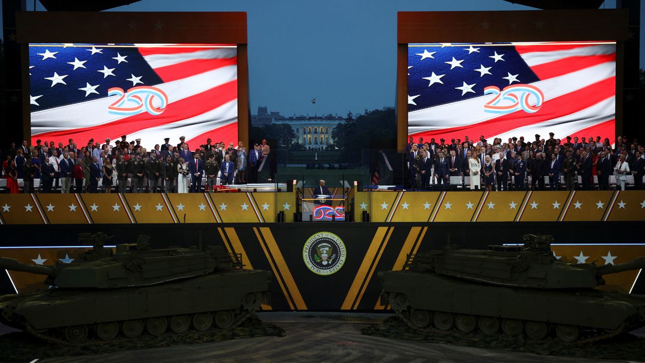 President Donald Trump speaks as he attends a military parade to commemorate the US Army's 250th Birthday, on the day of his 79th birthday, in Washington, DC.