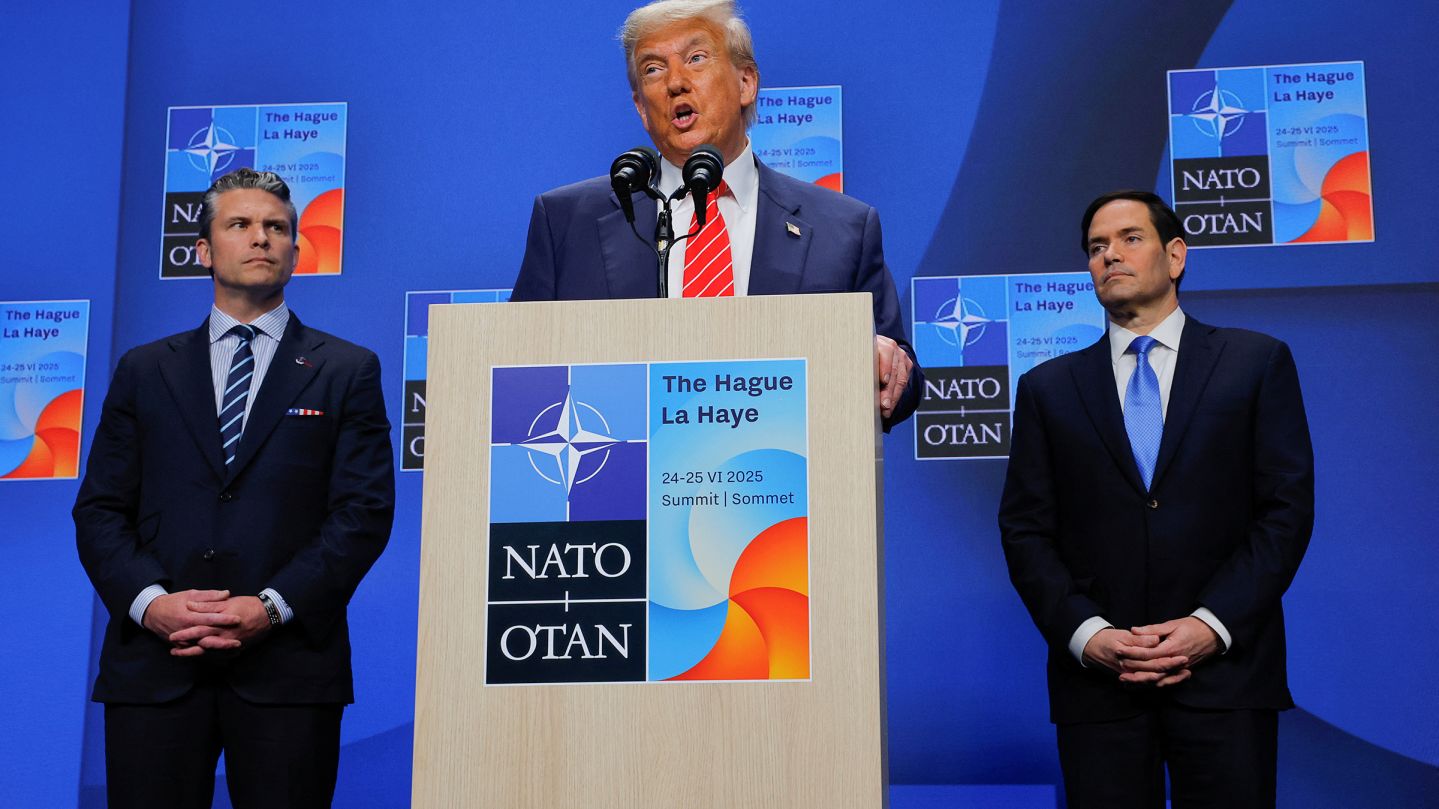 President Donald Trump speaks at a press conference, as Secretary of Defense Pete Hegseth and Secretary of State Marco Rubio stand near him, at the NATO summit in The Hague, Netherlands, on June 25.