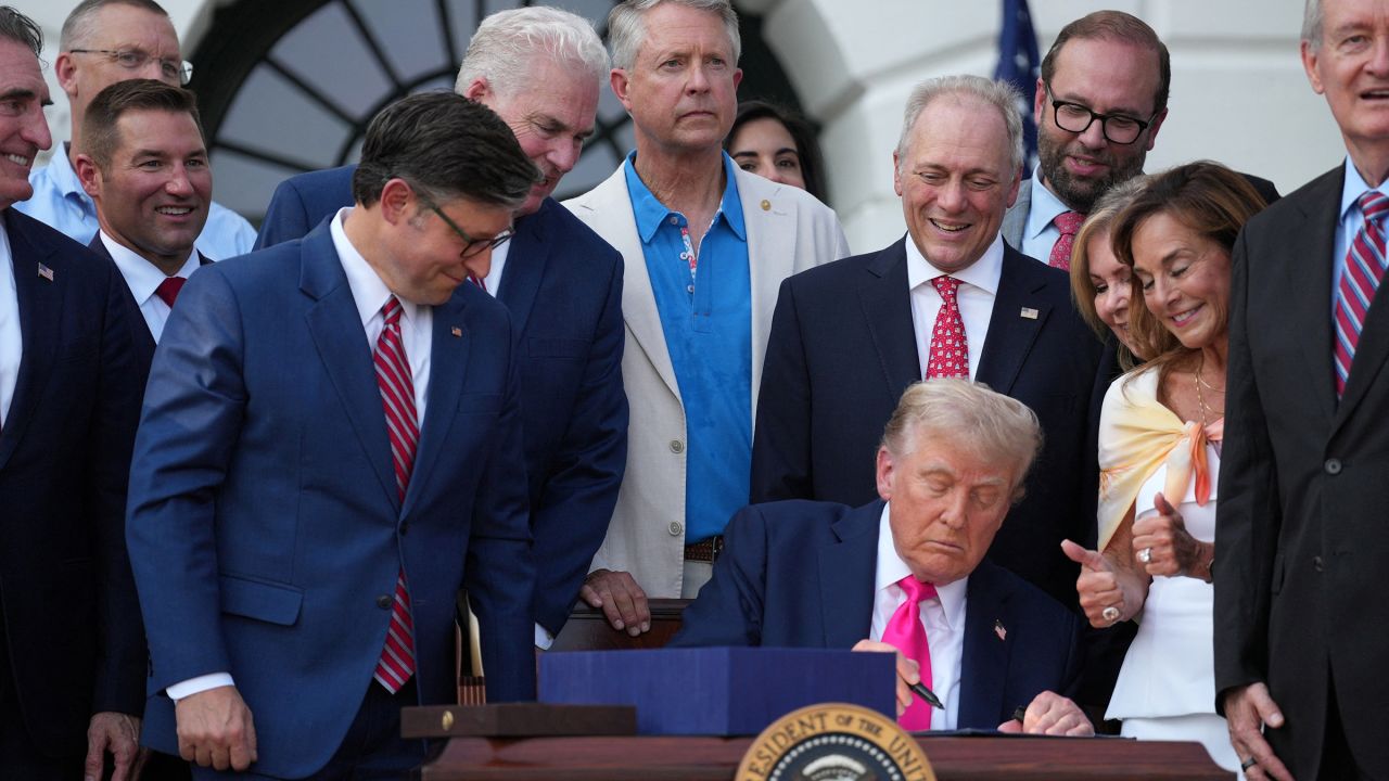 President Donald Trump signs a sweeping spending and tax legislation, known as the "One Big Beautiful Bill Act," at the White House in Washington, DC, on July 4.