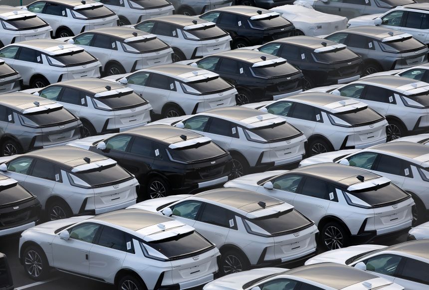 US automaker General Motors' Cadillac vehicles are lined up at a vehicle storage yard at an industrial port, on the day U.S. President Donald Trump struck a trade deal with Japan that lowers tariffs on auto imports, in Yokohama, near Tokyo, Japan, on July 23, 2025.