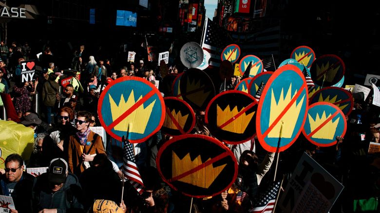 People attend a "No Kings" protest against U.S. President Donald Trump's policies, in Times Square in New York City, U.S., October 18, 2025.