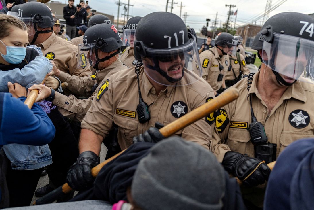 Members of the Illinois State police clash with protesters outside the Broadview ICE facility on October 17.