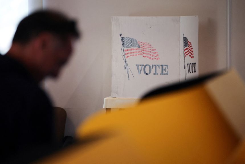 A man votes on Proposition 50 in Beverly Hills, California, on October 30.