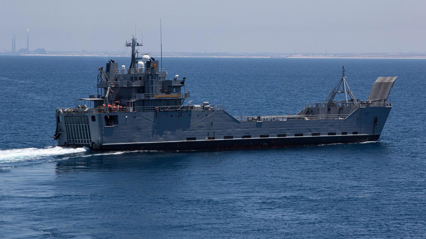 This handout photo from the US Army shows US Army vessel LSV-1 carrying humanitarian aid to the Trident Pier, June 11, off the coast of Gaza. 