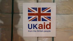 A UK aid label is attached to a box containing kitchen sets at a UK aid Disaster Response Centre in Gloucestershire, England.