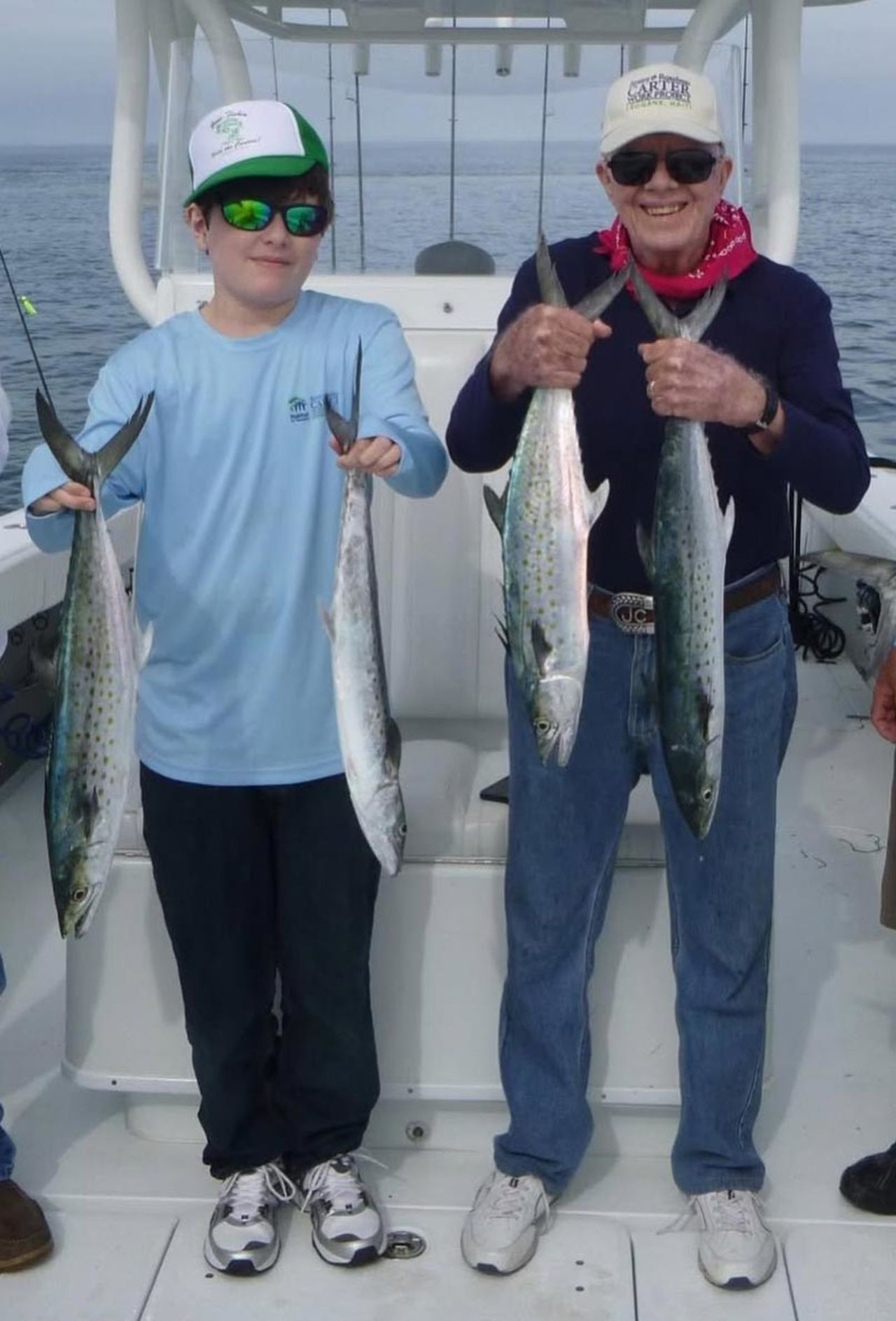 Hugo Wentzel and Carter during a fishing trip.